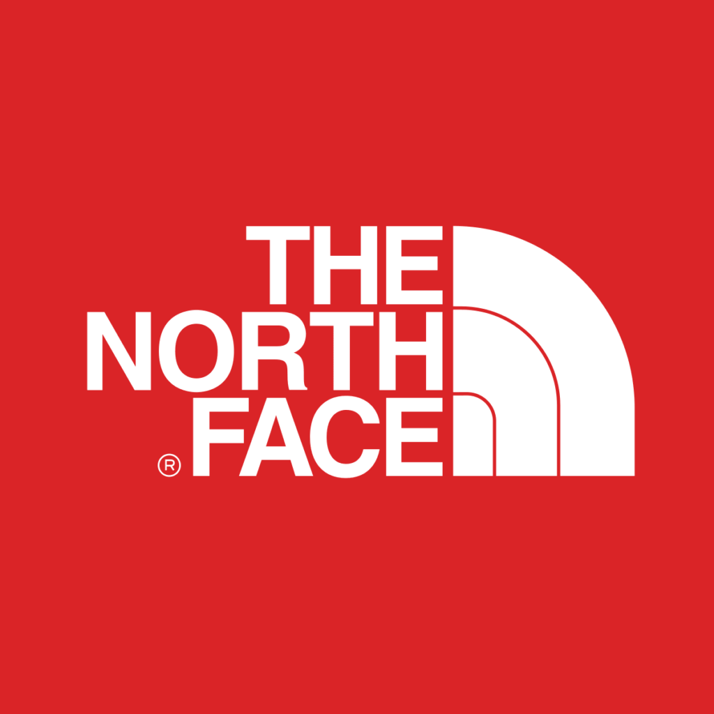 White The North Face logo on a red background.