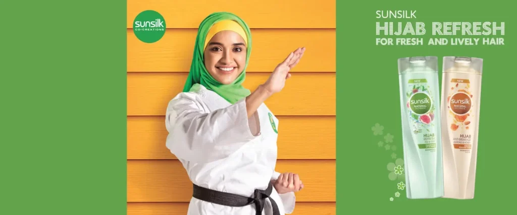 Advertisement for Sunsilk Hijab Refresh featuring a martial artist.